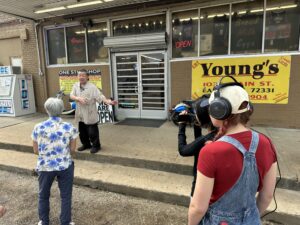 Community historian Emerald Dunn interviews a Chinese grocery store owner as part of the Arkansas Chinese Heritage Project (University of Central Arkansas).