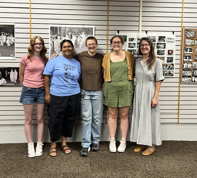 The College of Idaho team visits an exhibition of Japanese American historical photographs as part of the project The Past, Present, and Future of the Idaho-Oregon Buddhist Temple.