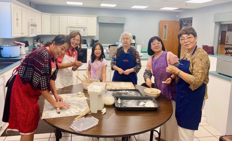 Community members preparing a meal as part of the project, Digital Storytelling—Identity Reconstruction of Diasporic Chinese American Seniors in one Rural Area of Ohio (The University of Findlay).