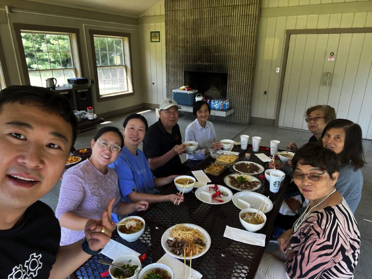Community members gathering for a meal as part of the project, Digital Storytelling—Identity Reconstruction of Diasporic Chinese American Seniors in one Rural Area of Ohio (The University of Findlay).