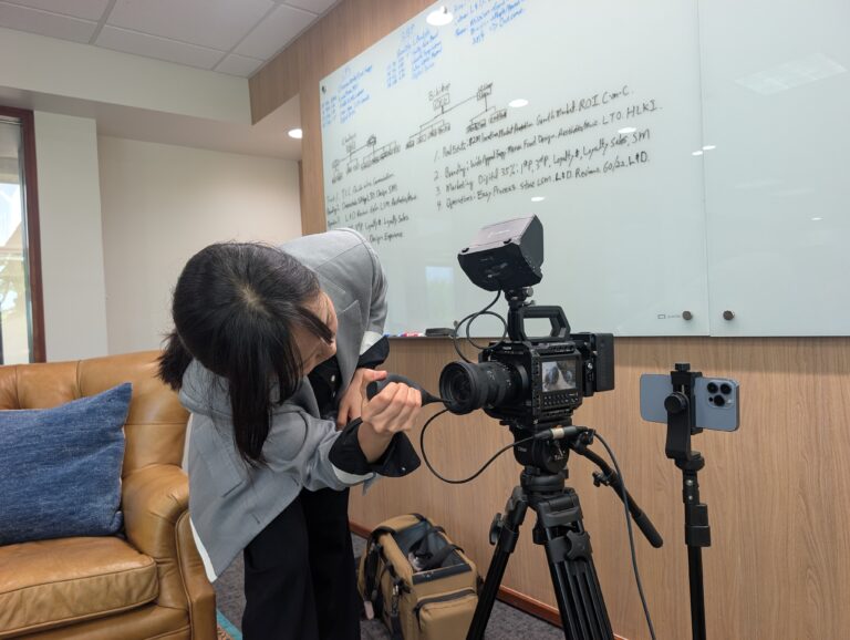 Wittenberg University student preparing for an interview as part of the project Bridging Generations in Columbus: Youth-Led Storytelling with First-Generation Korean Business Owners and Workers
