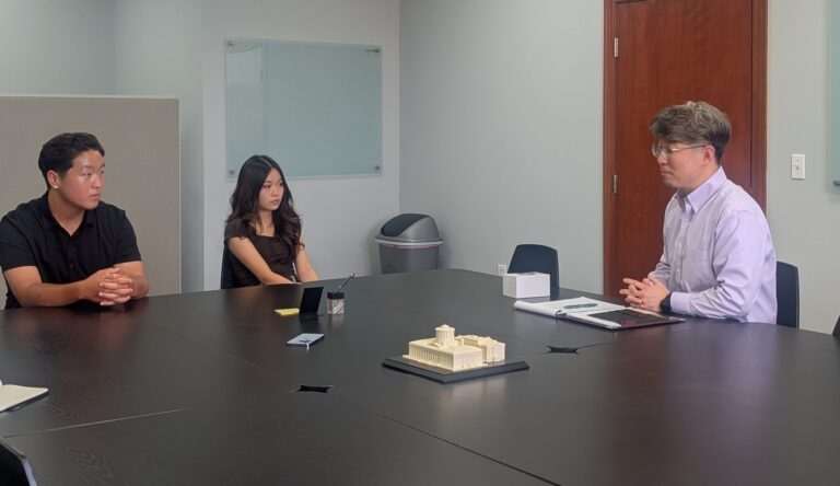 Wittenberg University students interviewing a Korean American business owner for the project Bridging Generations in Columbus: Youth-Led Storytelling with First-Generation Korean Business Owners and Workers