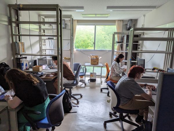 Students reading scientific articles in our office at Kyoto University’s Center for Evolutionary Origins of Human Behavior in Inuyama Japan.