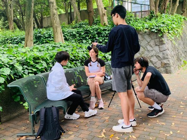 Interview with a member of BOND, an activist group that advocates for migrant rights, at Hibiya Park, Choyoda City, Tokyo. (May 26)