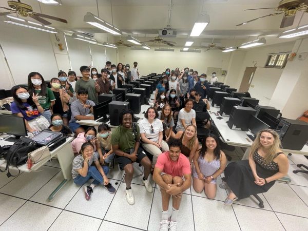 Students Thomas Mayiga, Nathan Barnes, Mariam Hohvannisyan , Capri Michelle Kalvelage , Ava Pulaski , Jia Zheng and Professors Ying Wu and Dimitra Papadovasilaki smiling for a celebratory picture after surveys were completed at Tunghai University