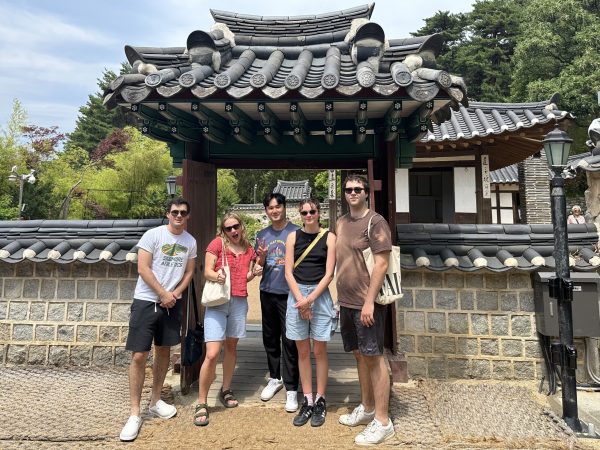 Skidmore College faculty mentor Dr. Joowon Park (pictured in the middle) and his student fellows Joey Geary, Hannah Liscord, Maddie Gunnell, and Tucker Obering (pictured left to right) pose for a picture in Gangneung-si, located on the east coast of South Korea.