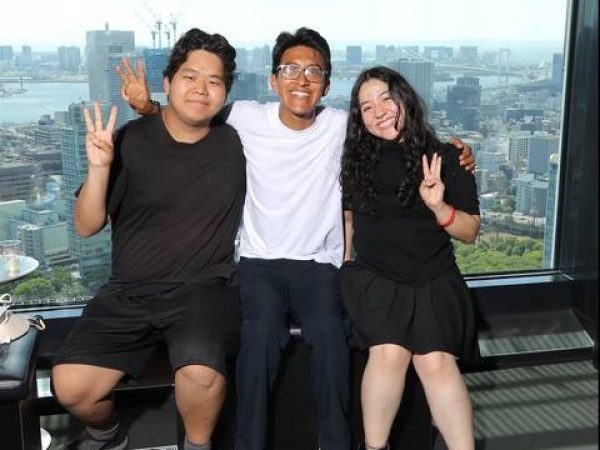 At the Tokyo Tower Top Deck Tour. You can see the scenic background that shows the skyline of Tokyo from a great height.