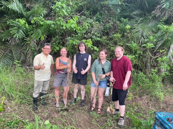 Student fellows posed with a local farmer, working in the banana garden

(Pictured: Wen Wenxiang (a local farmer), Tara Carrol, Callum Dooley, Mae Craig, Nick Newman)