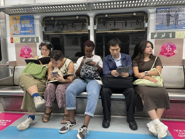 Students riding the subway in Seoul, South Korea.